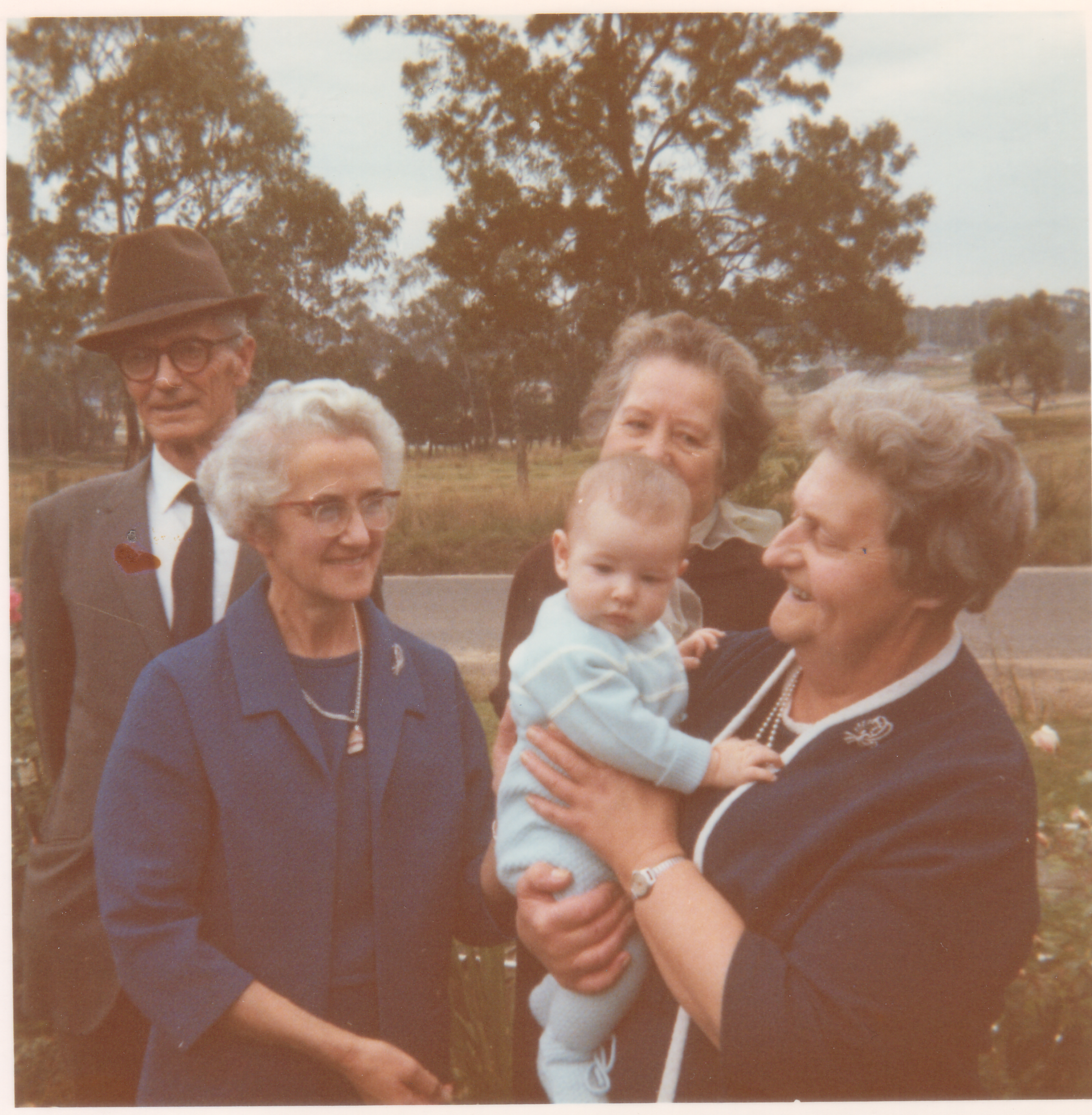 Photo of Francis Gammon, Mary Gammon (Francis's sister), Isabella Raeper, Ross Gammon (me) and Mary's friend for my Christening taken at 70 Durham Road, Kilsyth